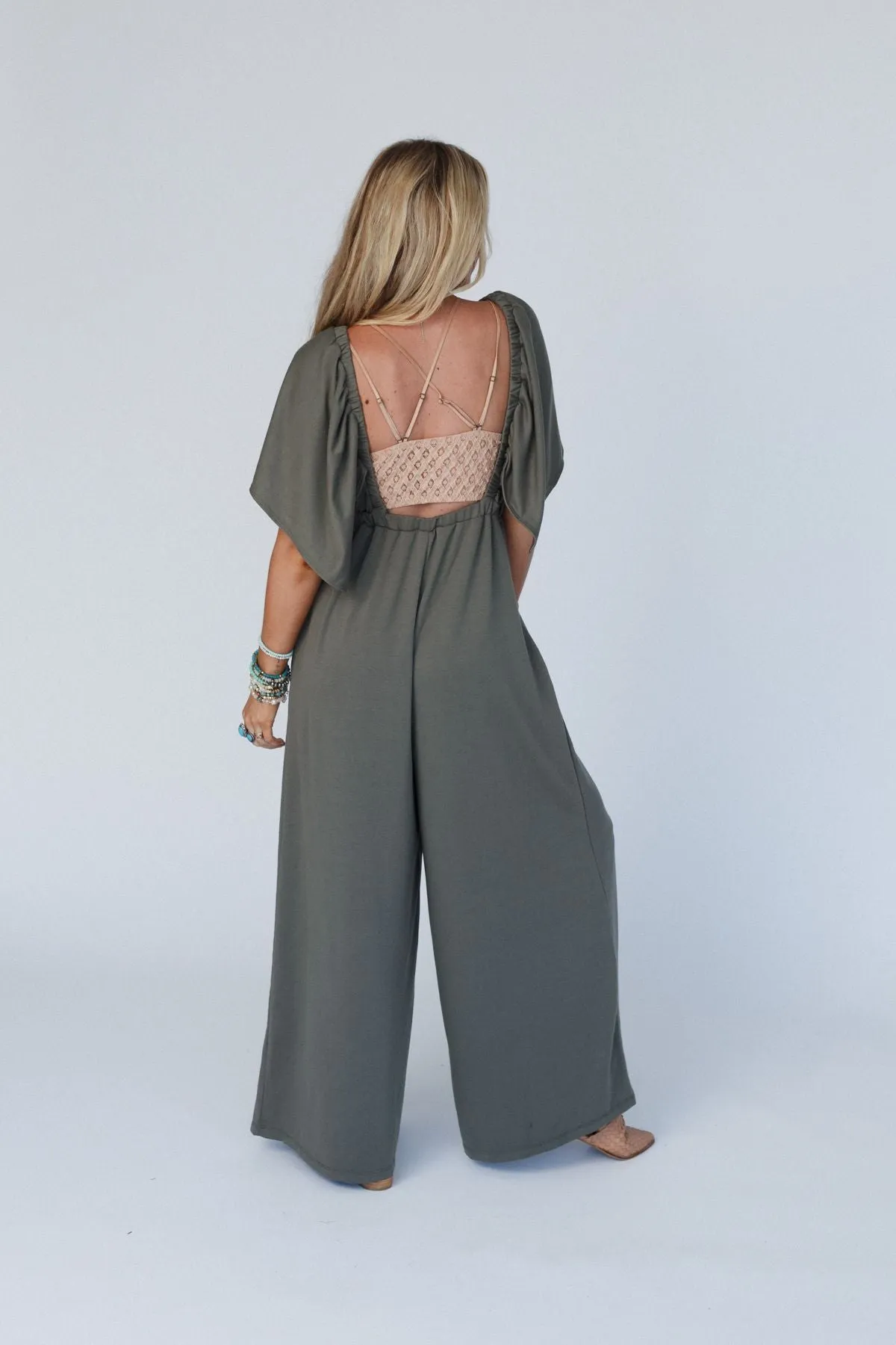 The Nest On Repeat Open Back Ruffle Jumpsuit - Light Olive